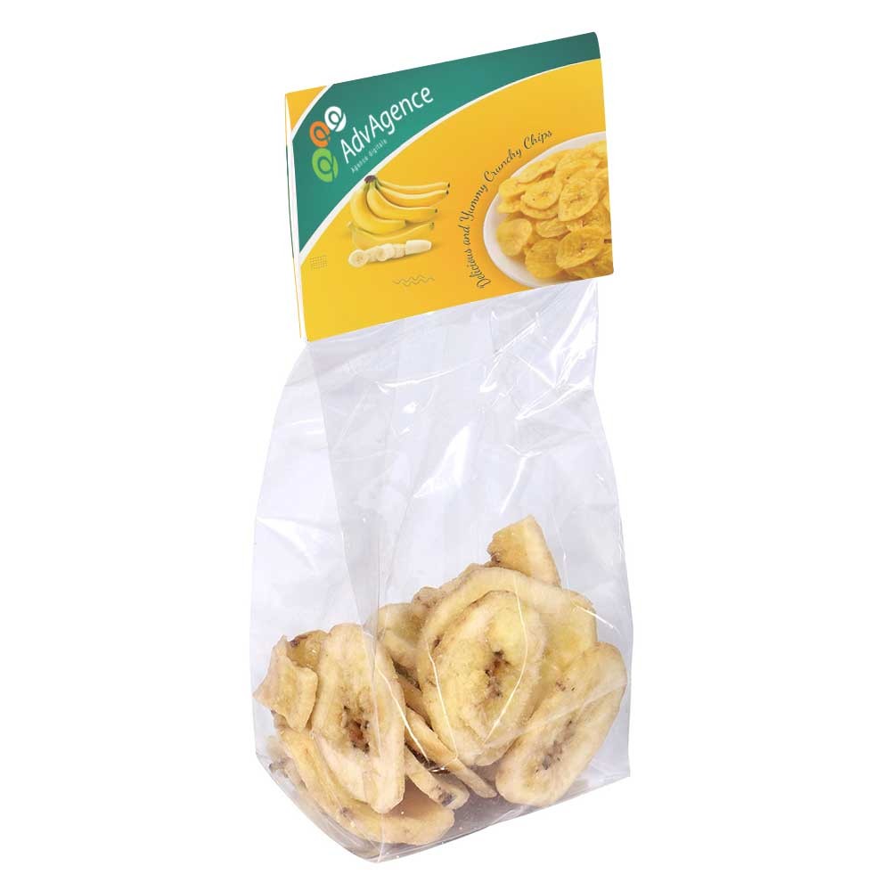 Transparente Tasche mit vollfarbig bedruckter Kopfkarte, gefüllt mit ca. 40 g Bananenchips - Sankt Johann im Pongau